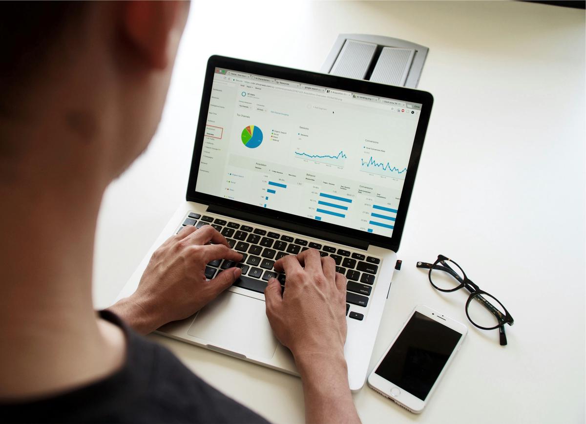 An image showing a computer screen with data-driven insights and analytics, guiding the development of tailored employee training programs.